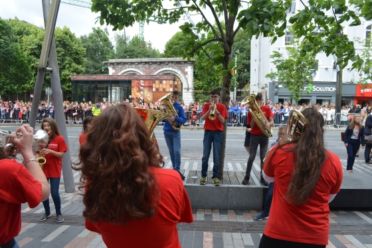 Cork City musicians from the Barrack Street Youth Band provide a Royal Fanfare on Grande Parade!